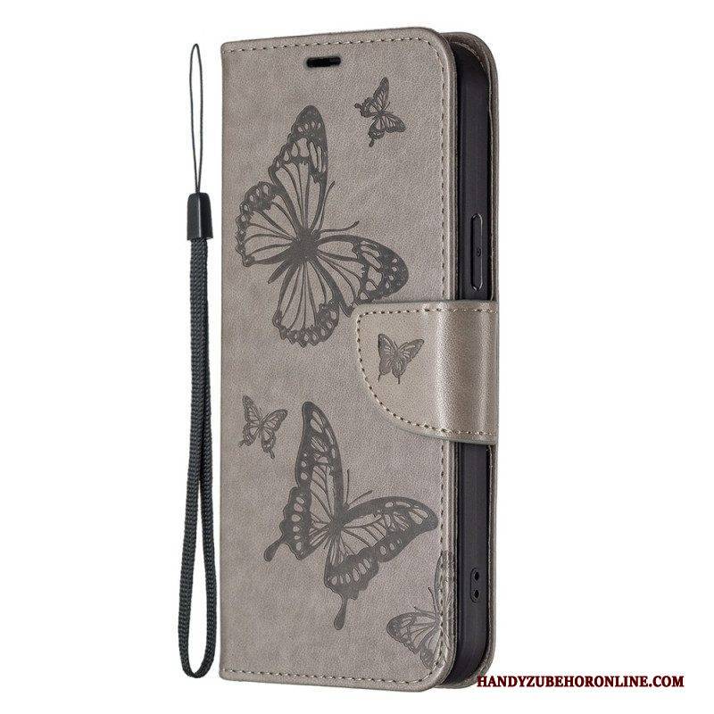 Flip Case Für Xiaomi 13 Mit Kordel Riemchen Mit Schmetterlingen-print